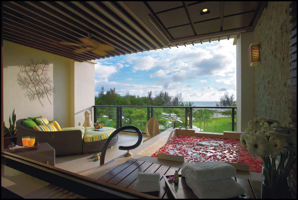 The Ocean Wing Balcony with oversized bathtub and day bed.