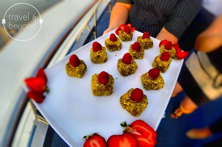 Chocolate terrine, pistachios and a cream filled raspberry